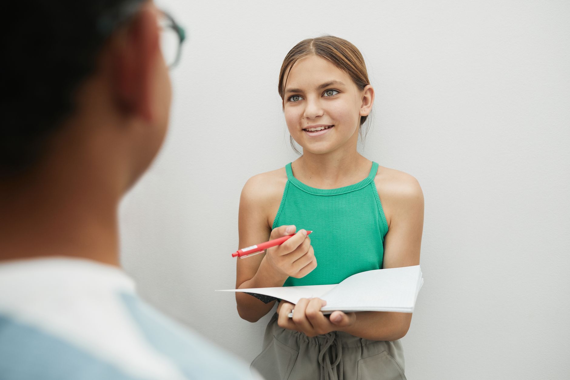 A mentor talking with a young person