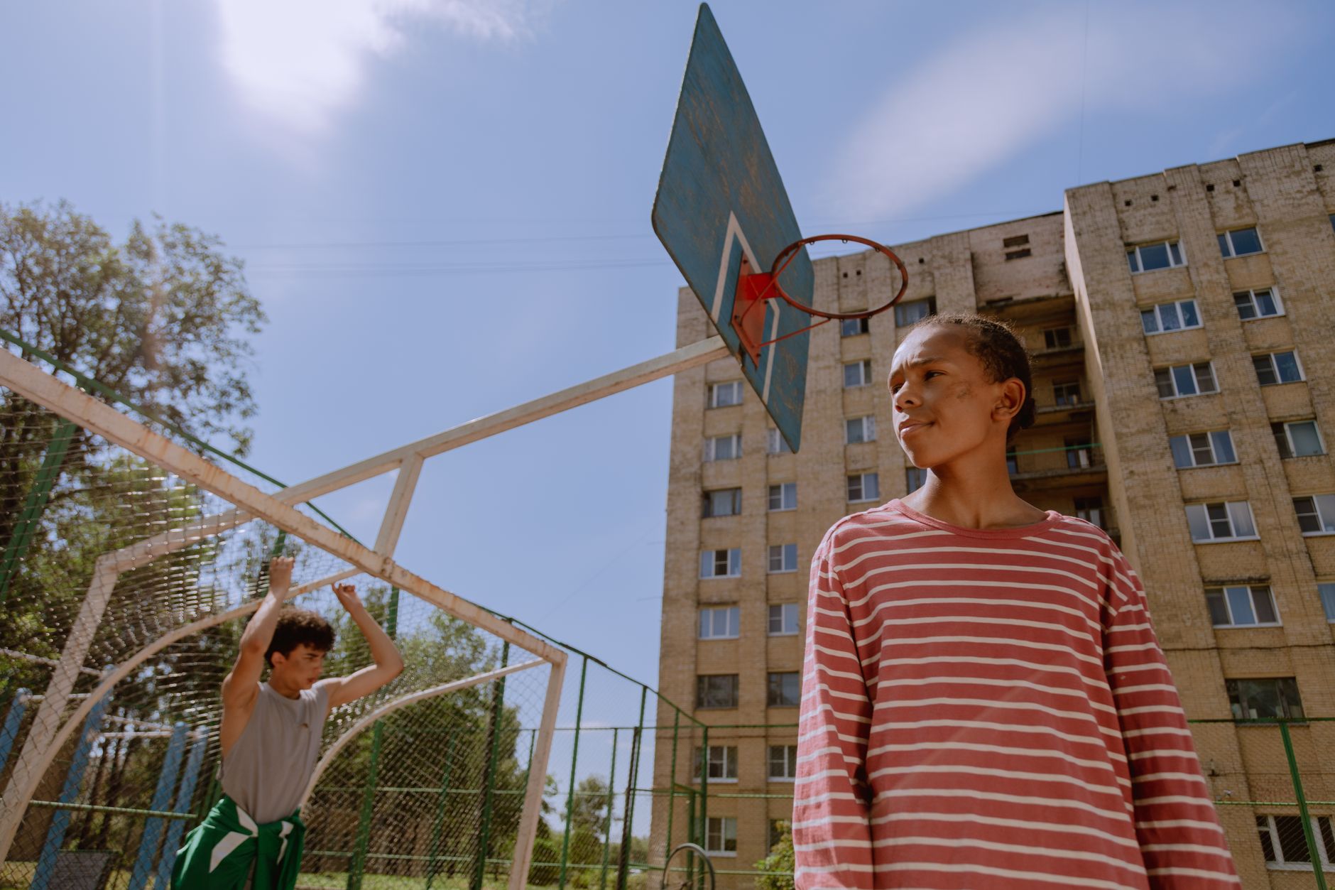 Young people on a community basketball court